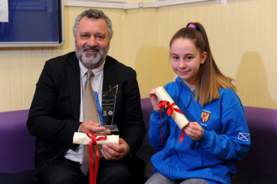 Martin Kasprowicz and Shannah Findlay with their awards.