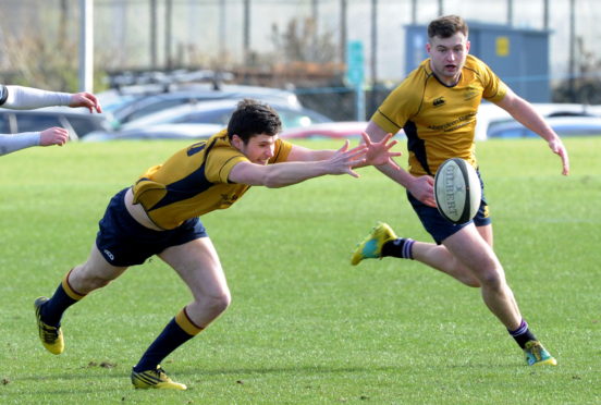 Gordonians (gold) v Ardrossan Academicals (blue).
Picture of Daryll Morrow going for a loose ball.

Picture by KENNY ELRICK