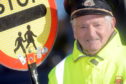 Jim Stewart has been a lollipop man for 20 years. Picture by Kath Flannery.