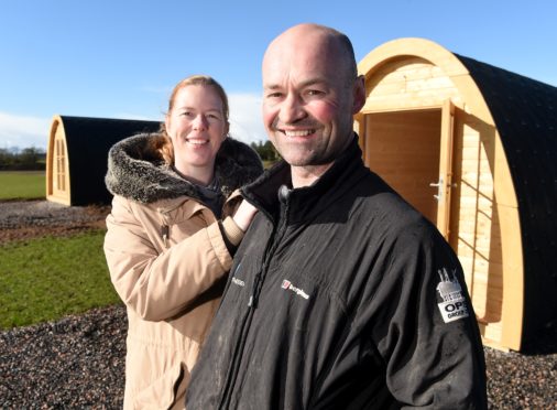 Ewan and Truus McConachie of Kinchyle farm, Nairn on the site of their new caravan and camp site which is set to open in the coming weeks. Picture by Sandy McCook