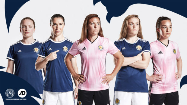 Aberdeen's Rachel Corsie (centre) models the new Scotland women's away kit, while Kim Little (far left) from Mintlaw wears the new home shirt.