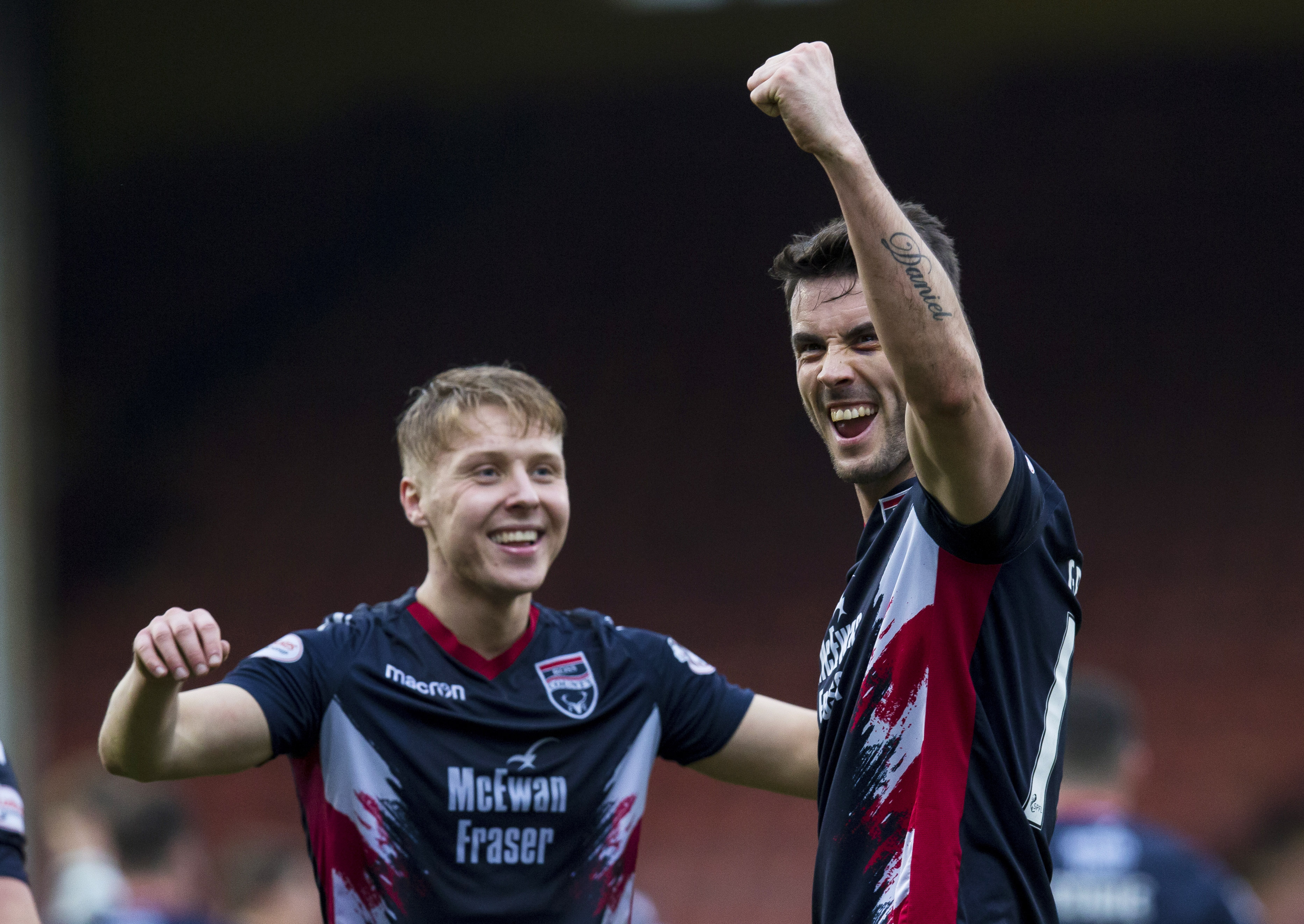 Ross County striker Brian Graham celebrates the win over Partick Thistle with Jamie Lindsay.