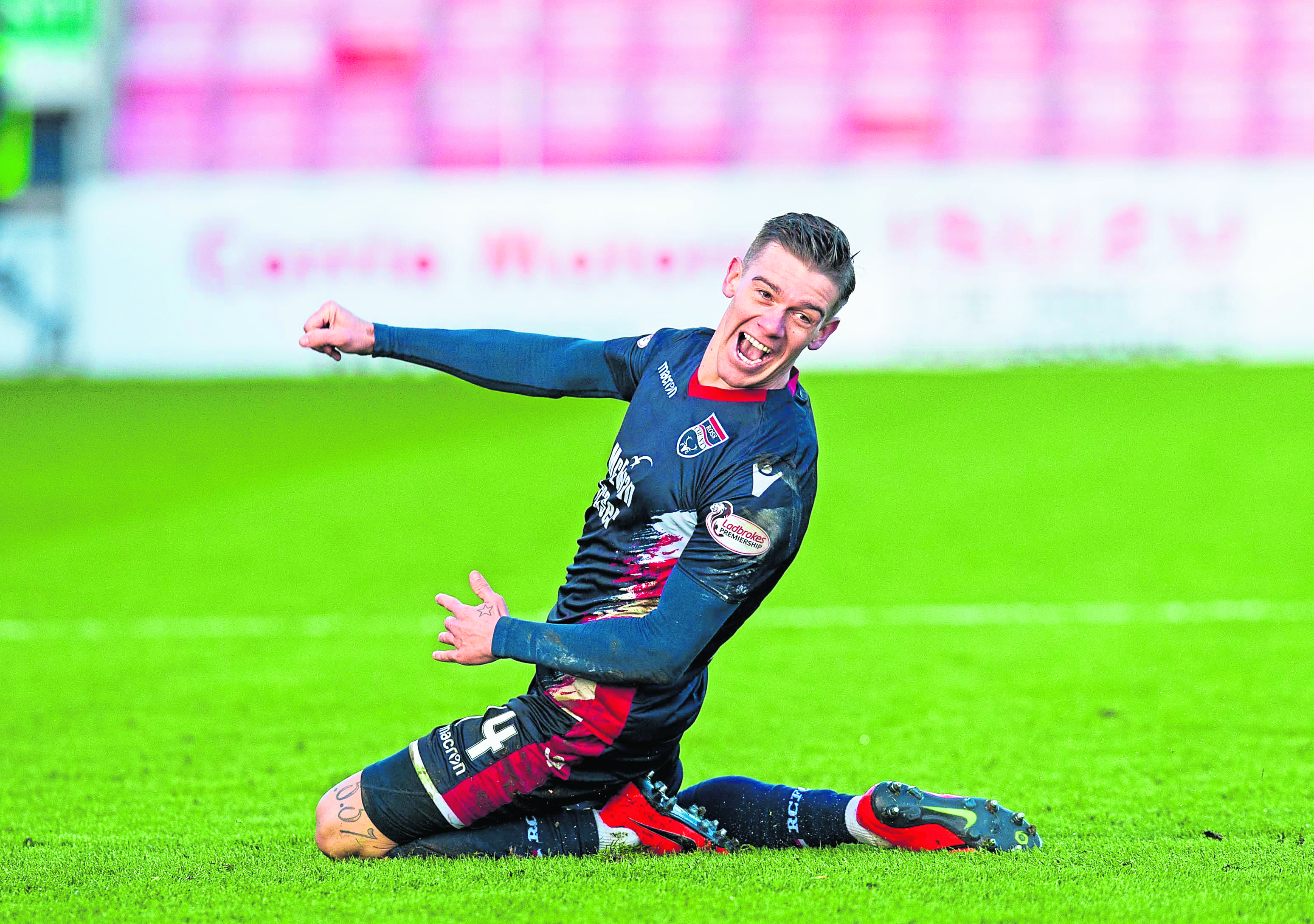 Ross County’s Josh Mullin celebrates after scoring the opening goal against Morton.