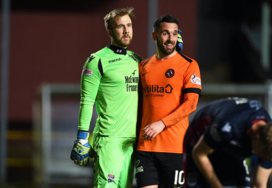 Scott Fox and Nicky Clark during Tuesday's game between County and Dundee United.