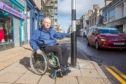 Nairn Access Panel Chairman Seamus McArdle  at the new crossing point on the busy High Street in Nairn.