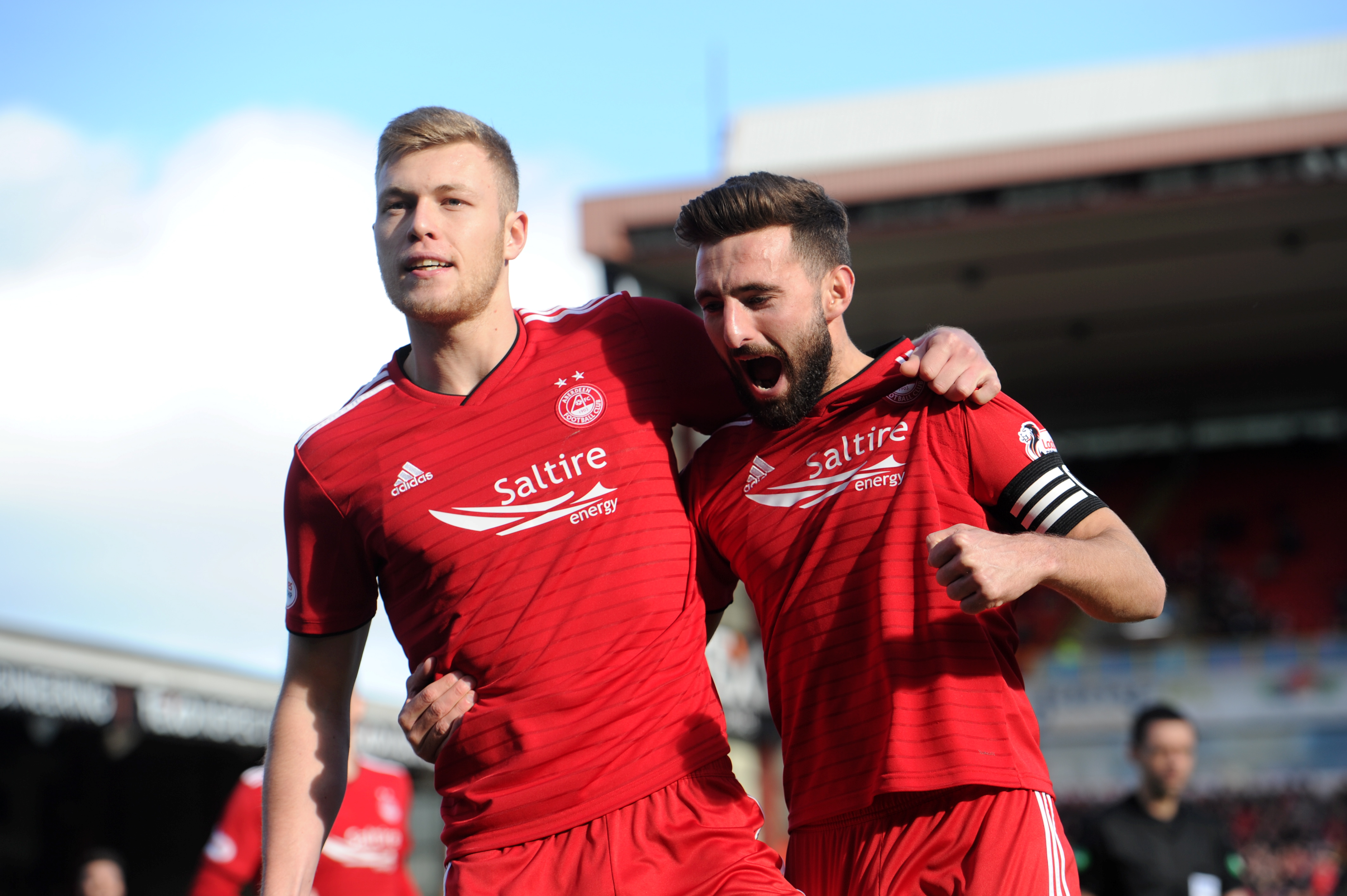 Aberdeen's Sam Cosgrove celebrates his goal with Graeme Shinnie after he scored from the penalty spot to put the Dons ahead