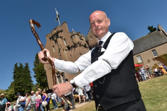 Graham Guyan with Harry Lauder's walking stick.