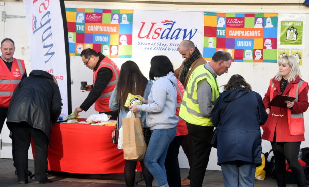 Shop workers from union Usdaw gather on Union Street in 2019.