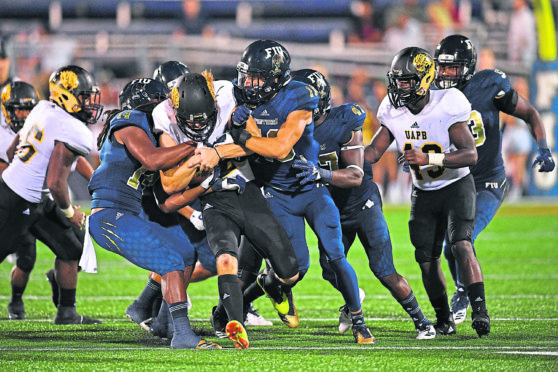 Jamie Gillan #42 of the Arkansas-Pine Bluff Golden Lions running the ball