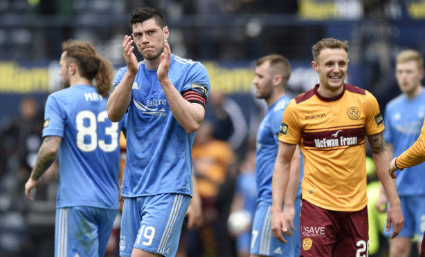 Scott McKenna captained Aberdeen for the first time in last year's semi-final against Motherwell.