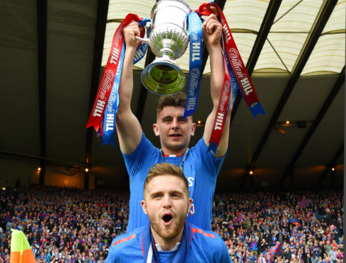 Aaron Doran, top, lifted the Scottish Cup with Inverness in 2015.