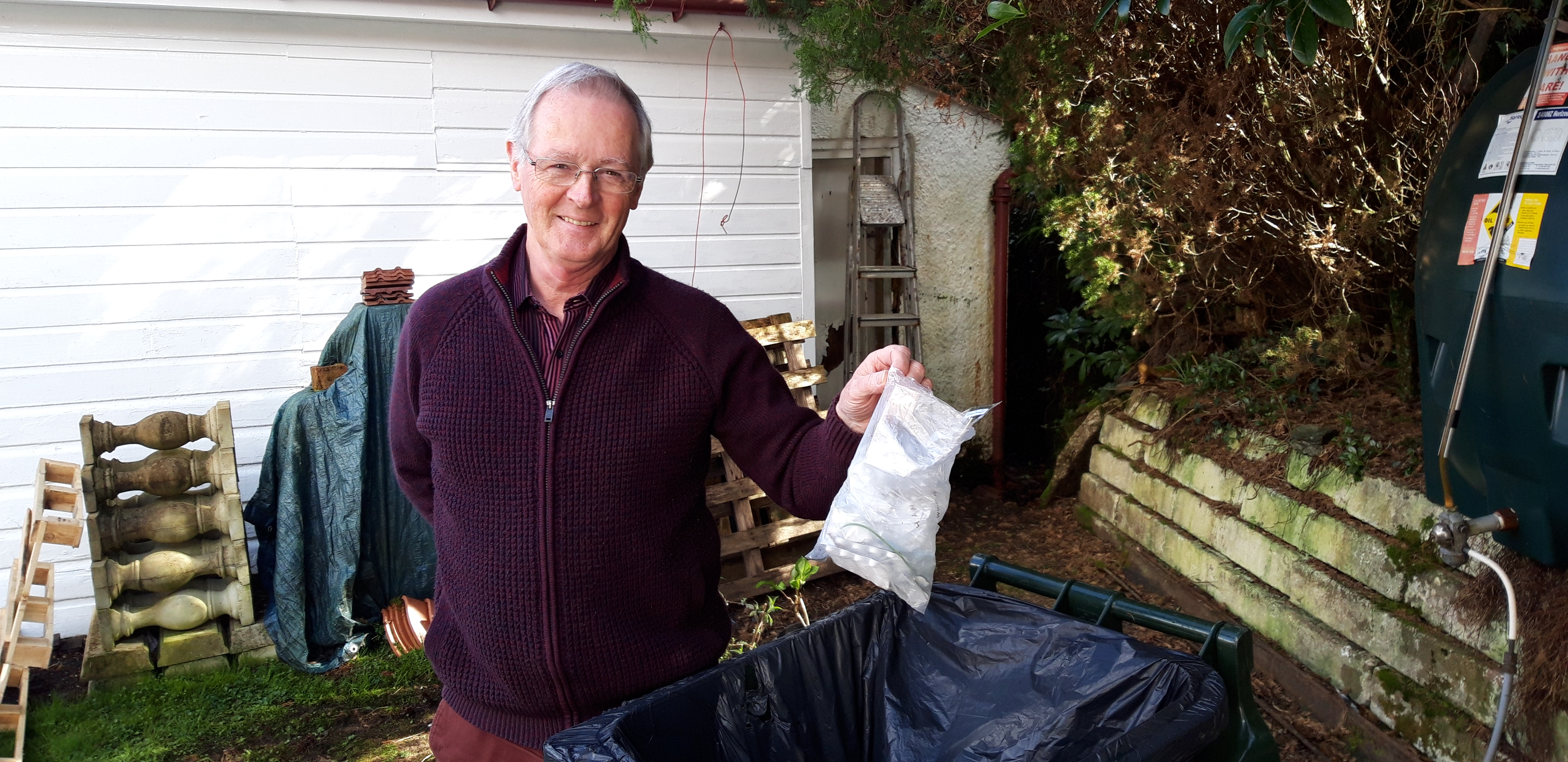 Councillor Allan Henderson wants people to take home their rubbish and put it in the bin.