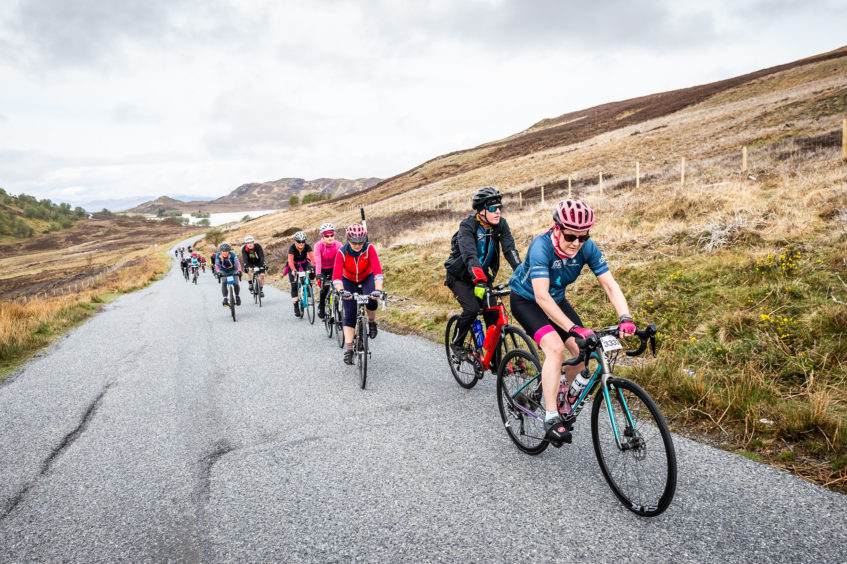 Cyclists on the final ascent of the King of the Mountain stage to the Suidhe viewpoint.