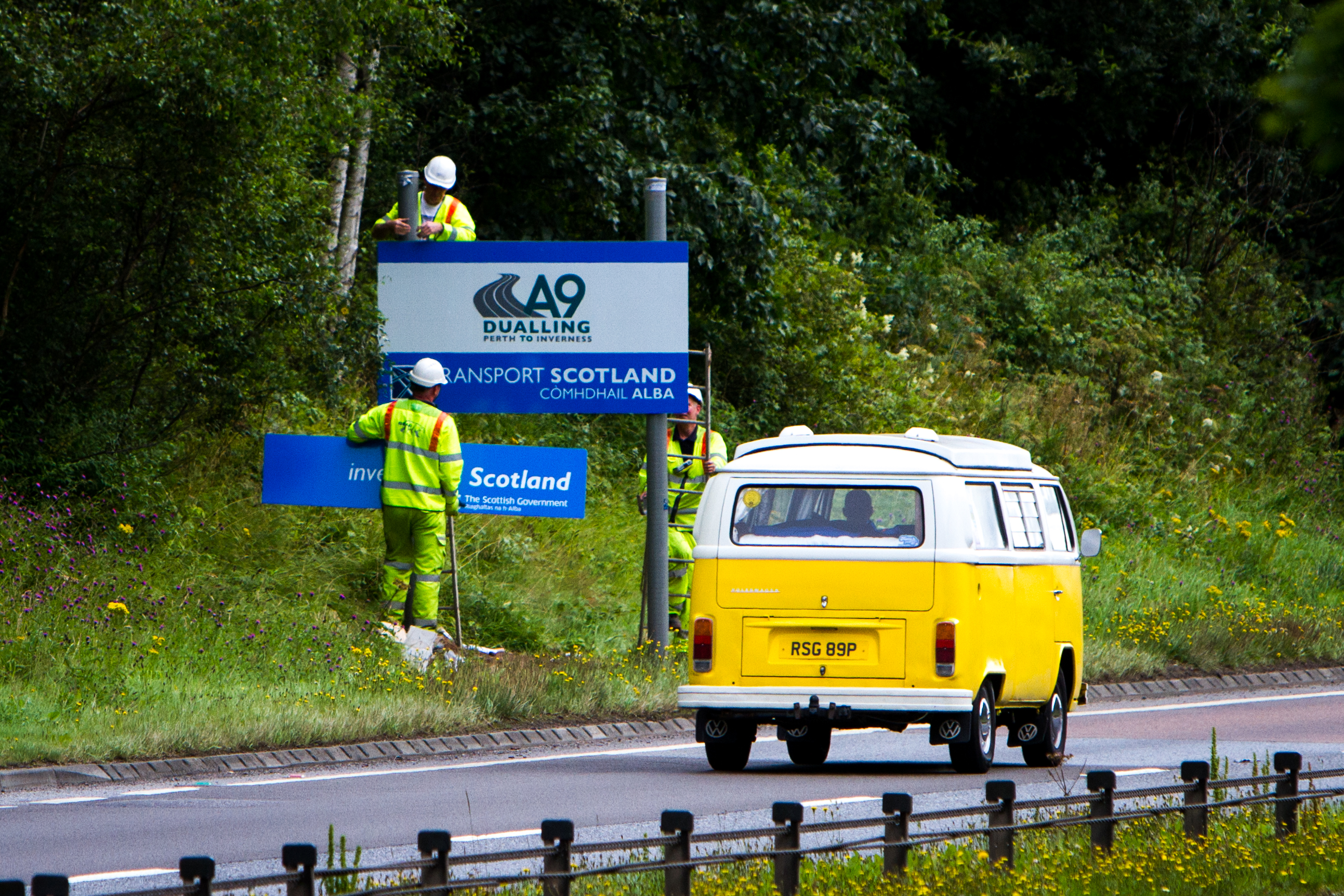 Signs for the A9 dualling project being put up north of Perth.