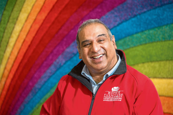 Zafar Ali, owner of Buckie Furniture and Carpet Centre is pictured inside his store. Picture by Jason Hedges.