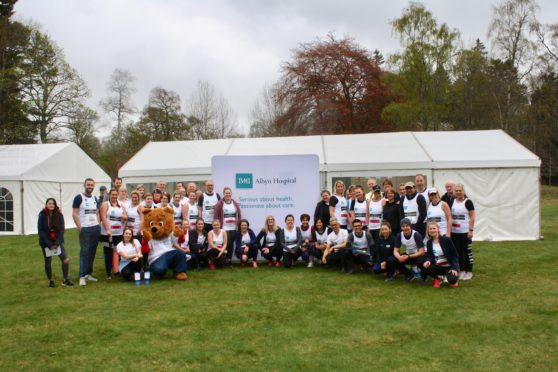 Staff and consultants from BMI Albyn Hospital, who took part in the Balmoral Run, accompanied by Aberdeen Cyrenian’s Buddy the Bear and Vanessa Wilhelm of the charity