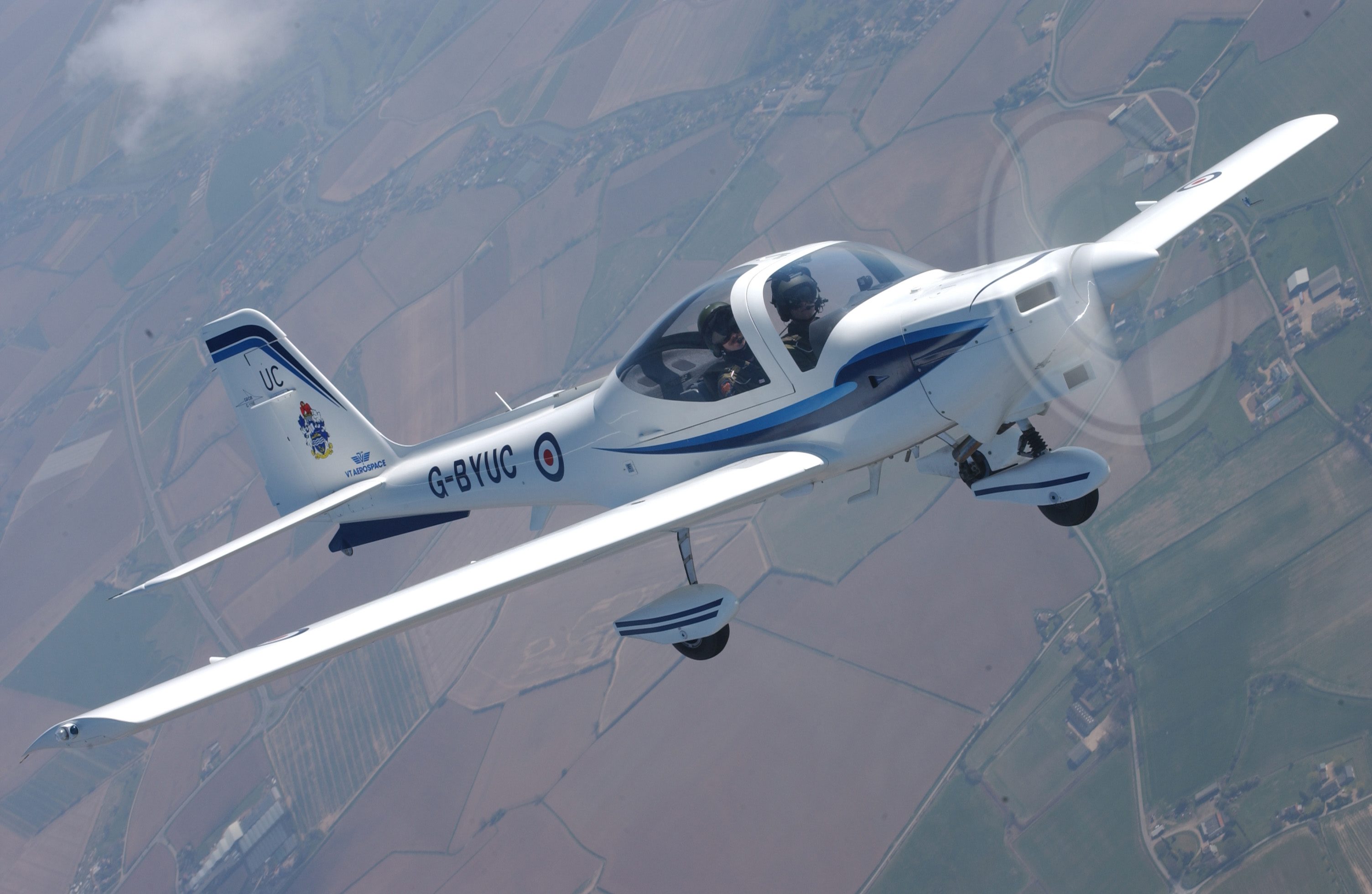 A Grob Tutor photographed over Lincolnshire, similar to the one to be used by the students.