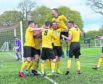 Cove celebrate their opening goal at East Kilbride.