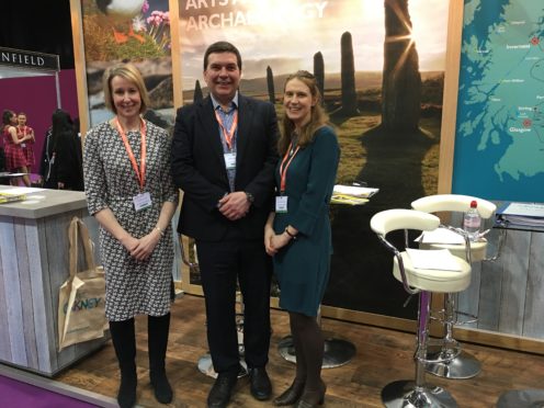 Elaine Tulloch with Gareth Chrichton and Kathleen Hogarth at the VisitScotland Expo, where interest in Orkney skyrocketed