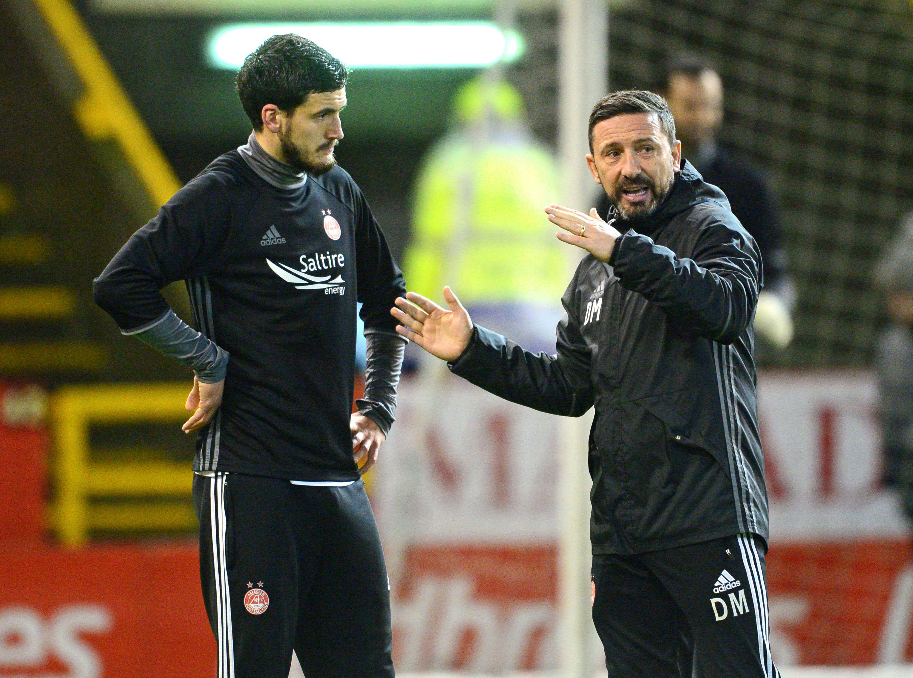 Anthony O'Connor and Aberdeen manager Derek McInnes.