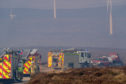 This is the scene of the Fire Units within Pauls Hill Wind Farm, Moray, Scotland on Sunday 14 April 2019. It is understood that there are 7 units in attendance, however, the Fire is some distance away to reach. Photographed by JASPERIMAGE ©