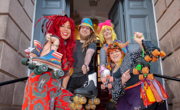 A funky roller disco for all ages was held at Forres House Community Centre in April to raise awareness of the Forres Skate Park Initiative. Getting their skates on are, left to right, Sophie Fullard, Franky Haymer, Kirsty-Ann Wilson and Fi Rodger. Picture: Marc Hindley