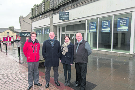 In Wick town centre, are Highland Councillors, from left,  Andrew Sinclair, Raymond Bremner, Nicola Sinclair and Willie Mackay.