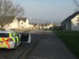 Police on the scene in Milton of Leys this morning.