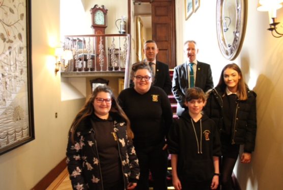 From left to right: Amy Ellis,  Libby Gordon,  Jonathan Cook,  Deryn Beattie.

In the background on the left is Kenny McMillan , General Manager of the Pittodrie House Hotel and on the right is Phil Gaiter , Rector, The Gordon Schools ,Huntly.