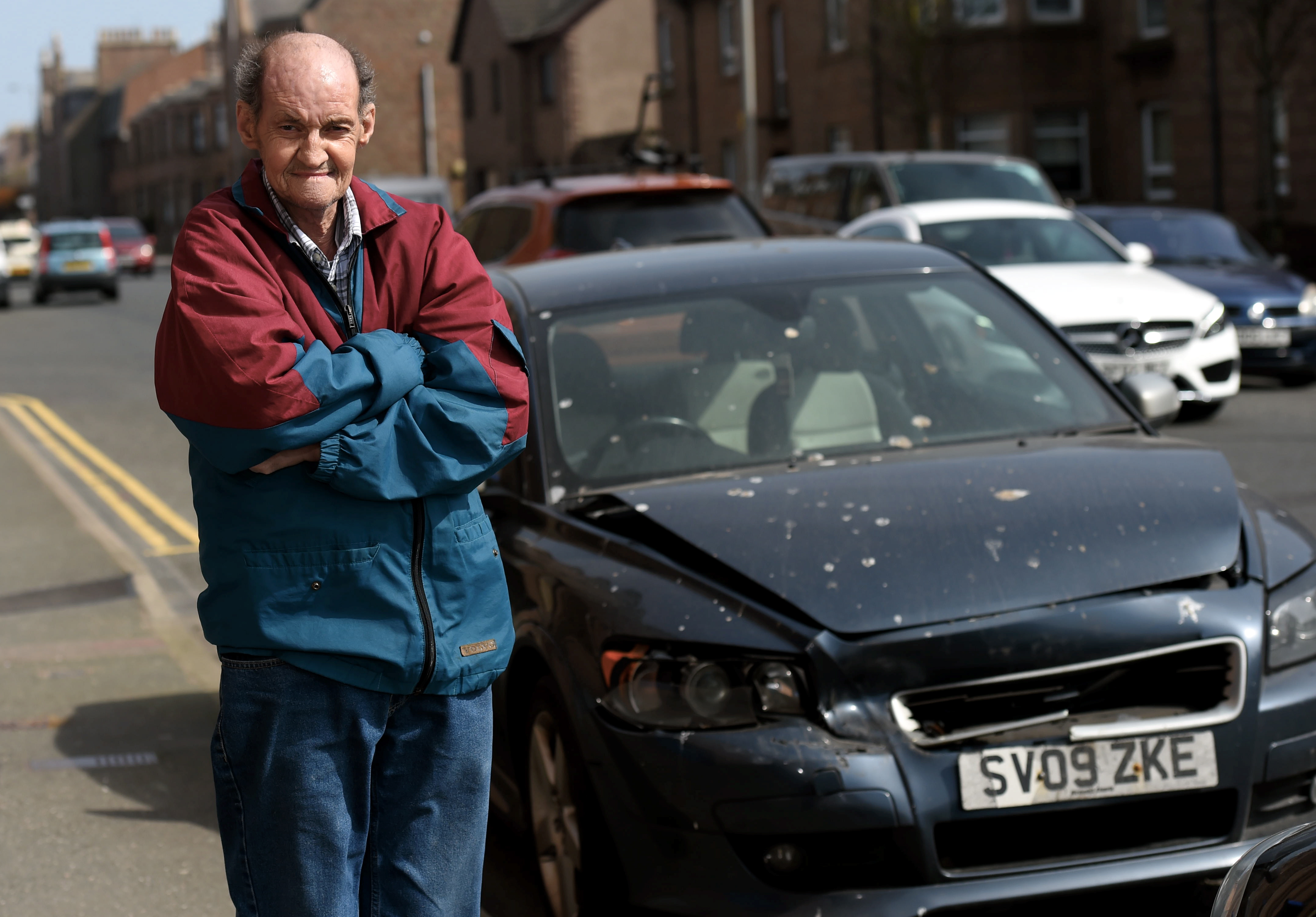 Eric Dean, 69, is unhappy with Aberdeenshire Council after he raised concerns about the broken down Volvo left near his home in King Street.