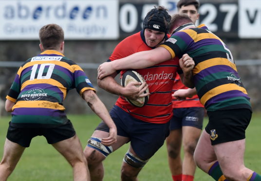 Aberdeen Grammar's Ewan Stewart (centre) plays his final home game for the club this weekend.