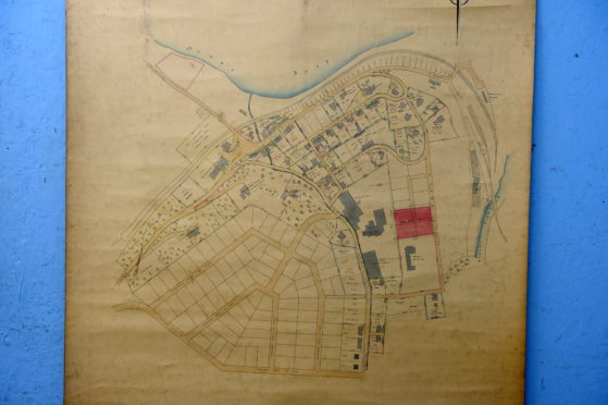 Dave Smith from Bervie Auctions, Inverbervie, is auctioning off an old planning map of Craigellachie.