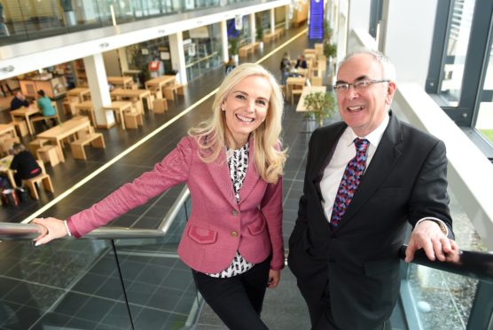 NHS Highland new chairman, Boyd Robertson with on the left new Director of Corporate Communications Jane McGirk. Picture by Sandy McCook.