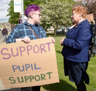 Protest organiser Skye Hawkins (17) of Drumnadrochit speaks with council leader Margaret Davidson.