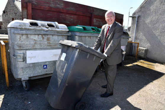 Councillor Glen Reynolds at the Whitehills bottle bank