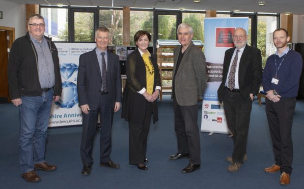 Members of Point and Sandwick Trust and Lews Castle College UHI after the organisations struck a new relationship over the funding