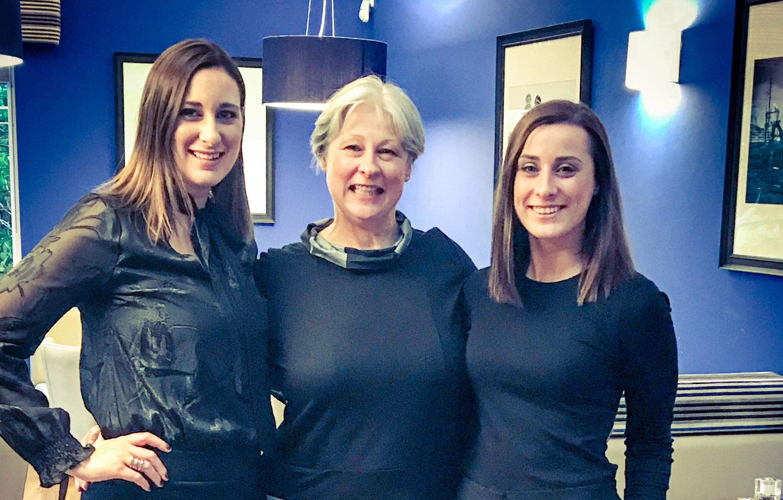 Sandra McKinlay (centre) who celebrated her 25 year milestone this week, pictured with daughters Lianne (left) and Laura (right).