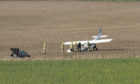 Light aircraft registration G-BKAZ seen crash landed at Newton of Ballunie Farm, Kettins, Blairgowrie.