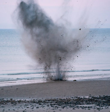 The Royal Navy carried out the controlled explosion at Roseisle Beach