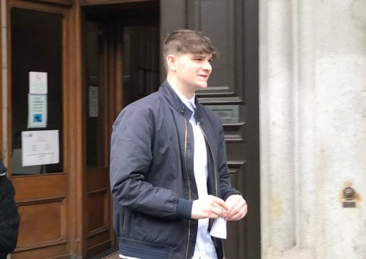 Cameron Reyboz leaving Aberdeen Sheriff Court.