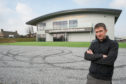 Royce Clark, managing director of Grampian Furnishers, next to the showroom's damaged car park.