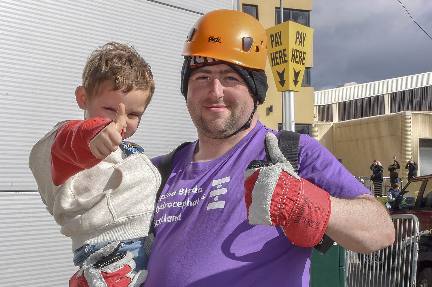 Dexon with Darren at the fundraising abseil