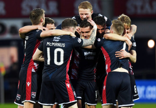 Ross County's Josh Mullin (centre) celebrates his goal to make it 3-0 with his team-mates
