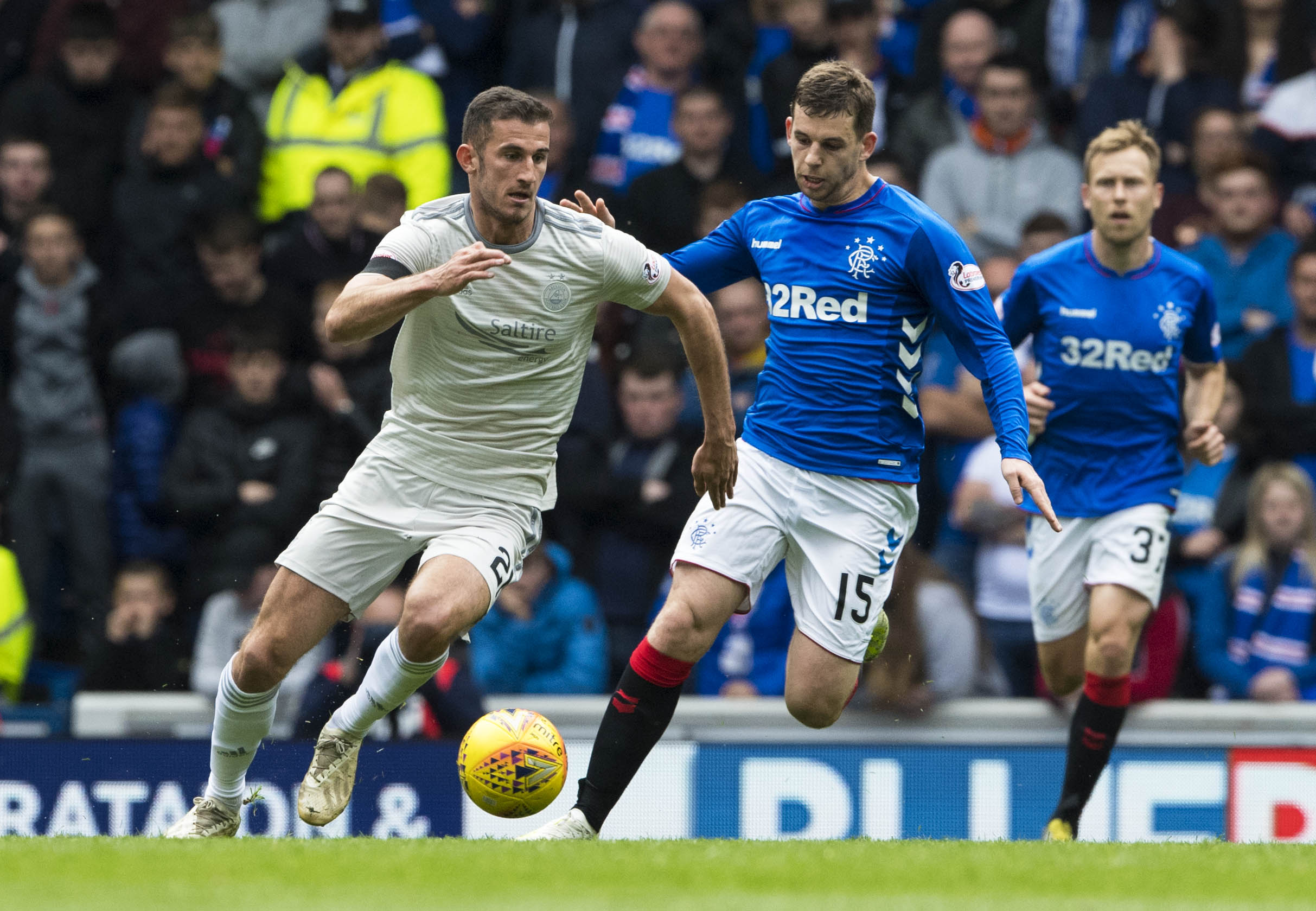 Aberdeen's Dominic Ball (L) in action with Rangers' Jon Flanagan