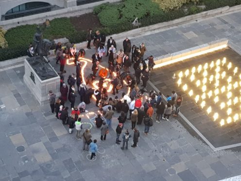 Candles were lit to remember those killed in the attacks