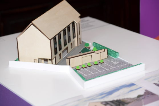 A miniature cardboard model of the proposed VSA facility.