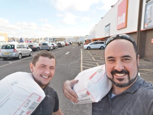 Mr Reid (right) has been getting in training at work