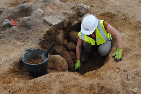 Excavation of a pit at Torvean