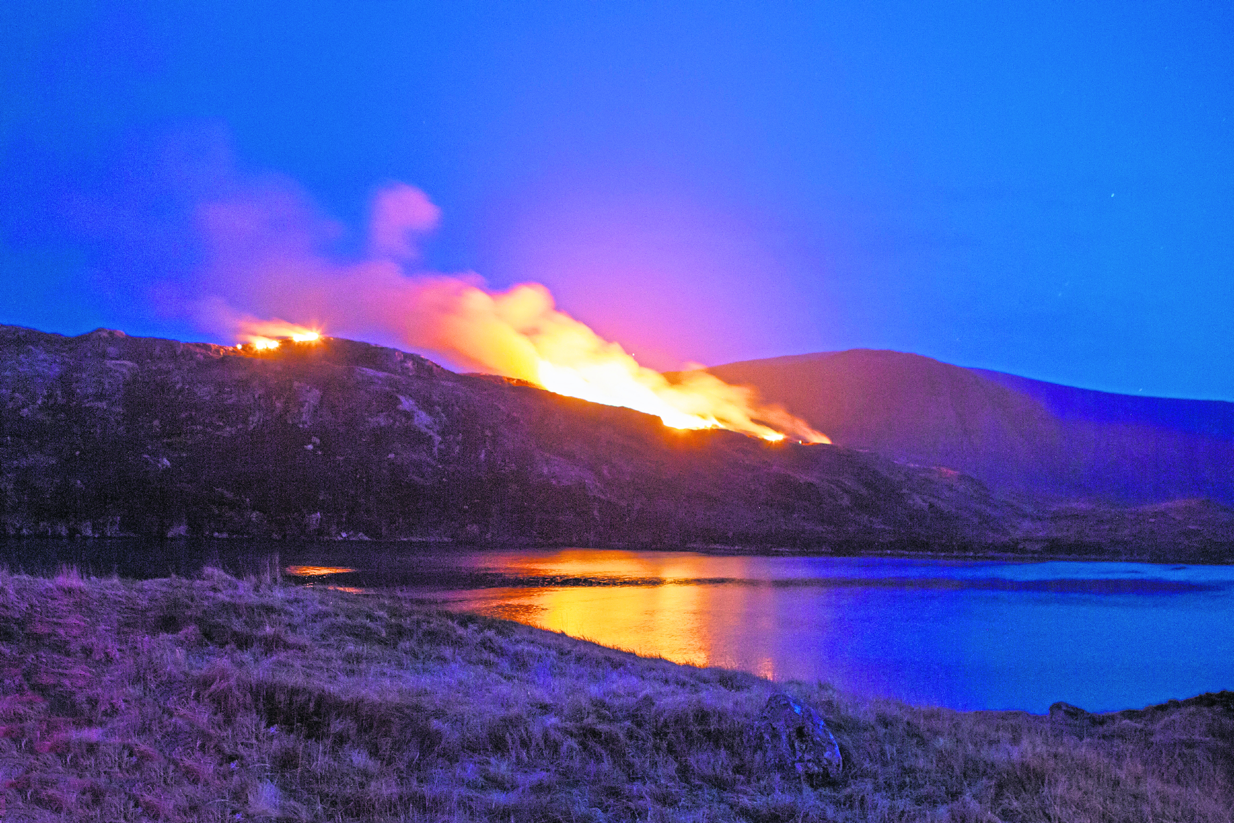 The view from Ardhasaig, north of Tarbert. The fires continued along the hill range past Tarbert to Direcleit.