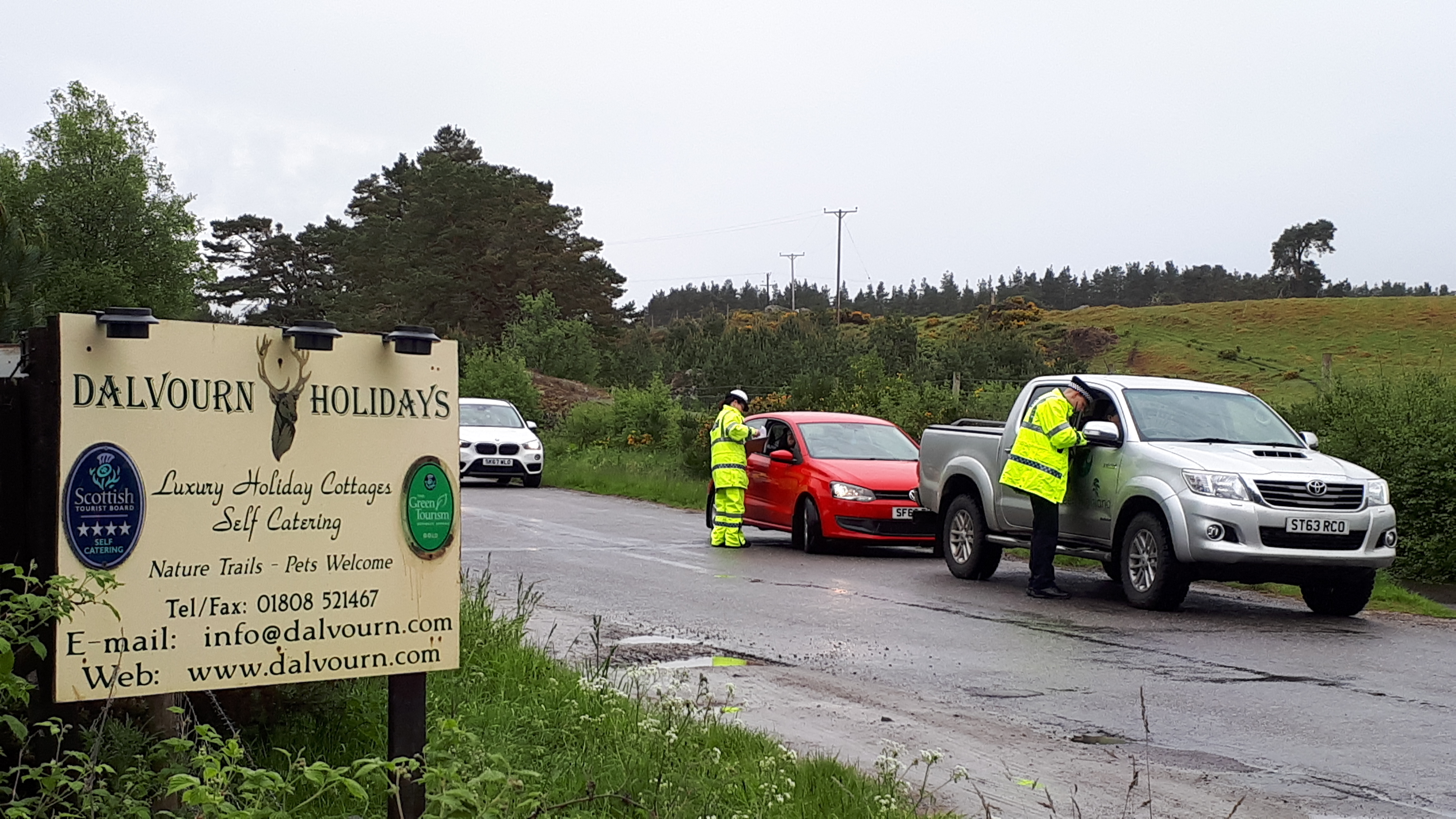 Police question motorists on the B851.